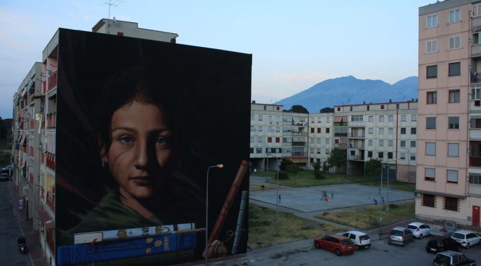 In foto, l’opera “Ael. Tutt'egual song' e criature” di Jorit Agoch al parco dei murales di Ponticelli\ilmondodisuk.com