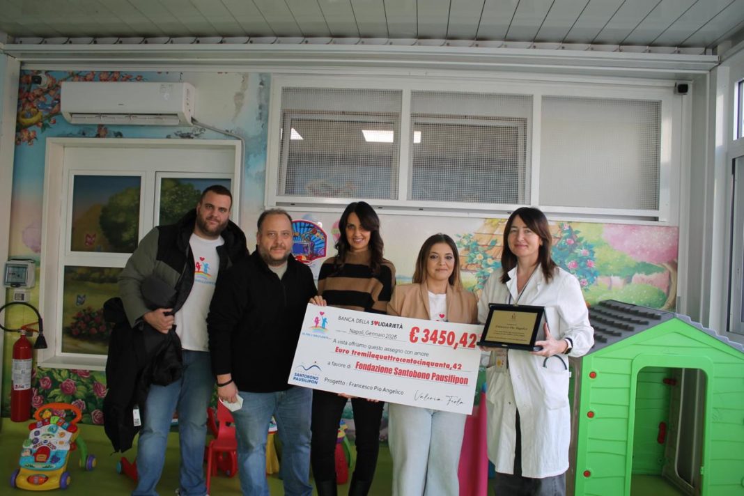 Consegna dell'assegno e della targa